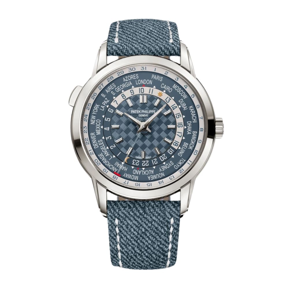 Patek Philippe World Time in white gold with blue city ring and date scale